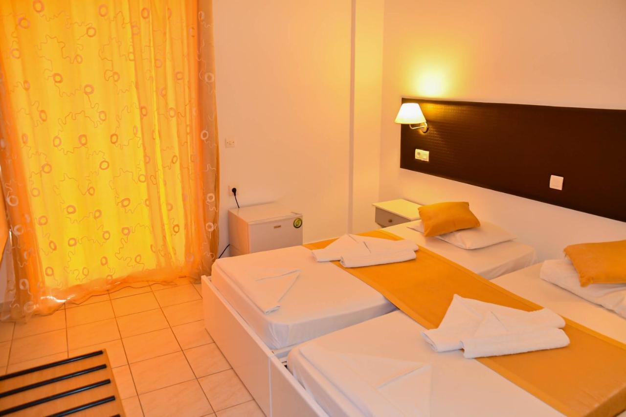 Blue Nest Hotel Тигаки Экстерьер фото