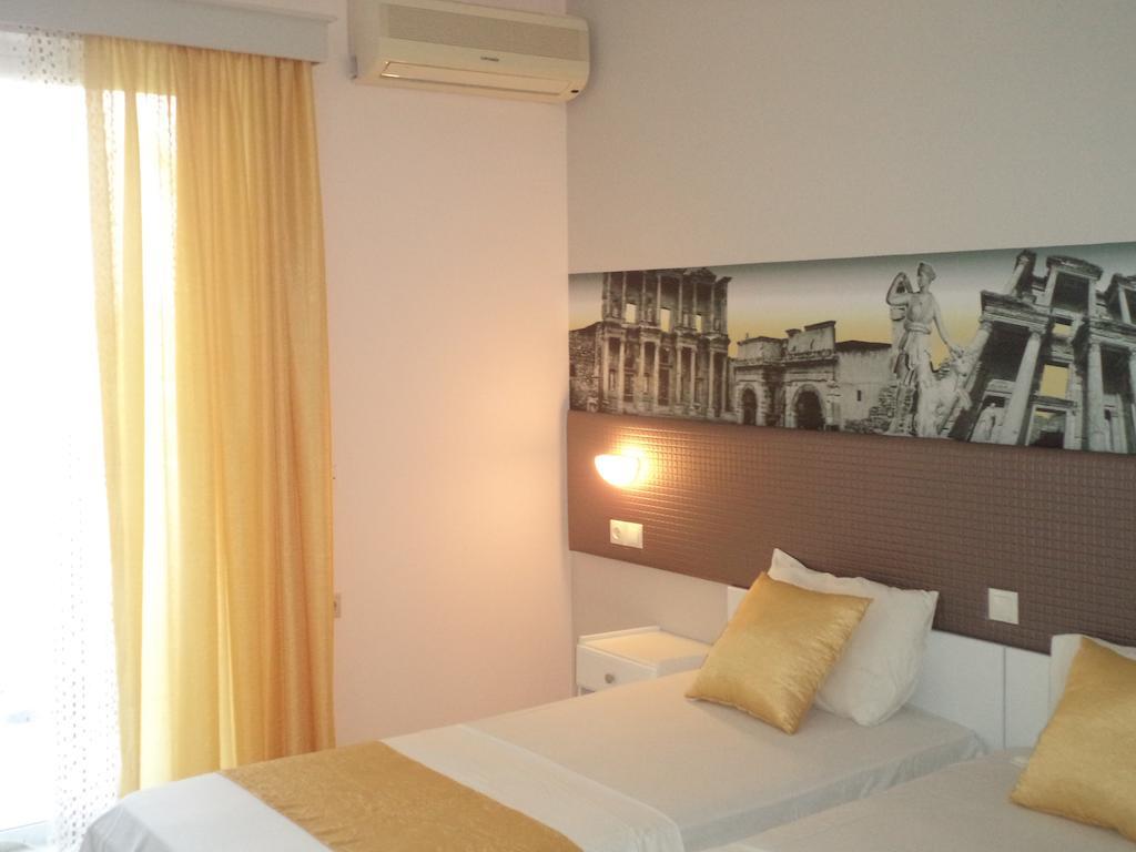 Blue Nest Hotel Тигаки Экстерьер фото