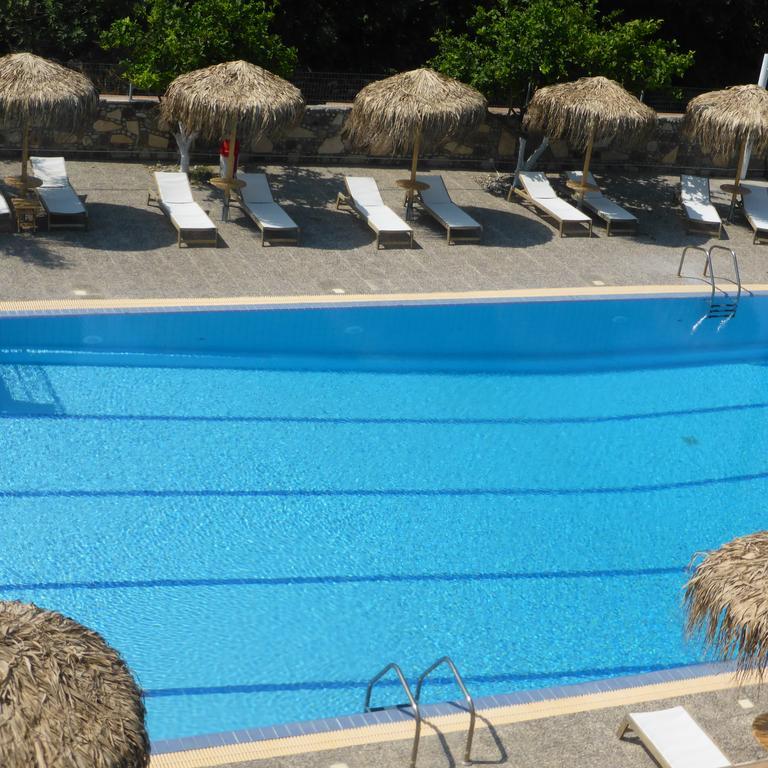 Blue Nest Hotel Тигаки Экстерьер фото